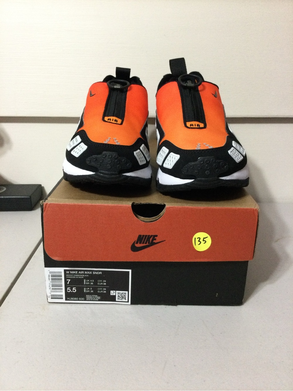 Nike women’s Orange Slip-On Athletic Sneakers